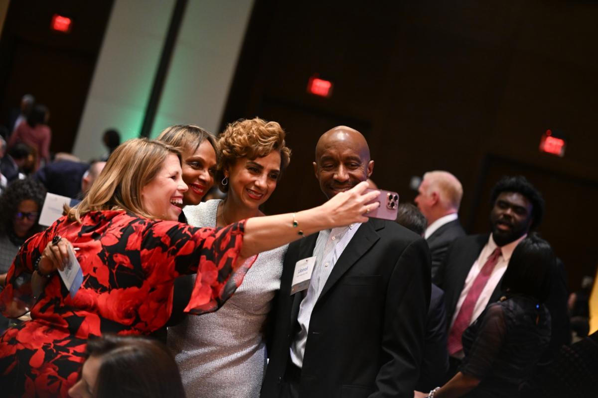 Group taking photo at event